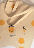 tote bag sonríe, · camiseta orgánica · edición limitada